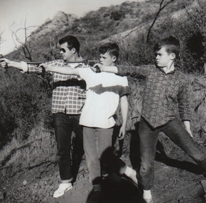 Jack Keller, Tim Keller, Terry Keller shooting targets with pistols