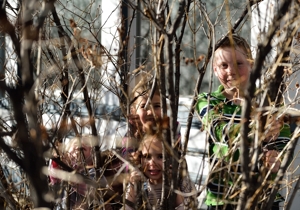 Kids in Bushes by Tim Keller