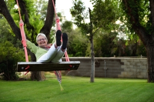 Betty Gandy swings, with daughter Page Gandy, Raton, by Tim Keller