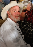 Michael Hearne in sound booth at 2014 barn dance festival, by Tim Keller