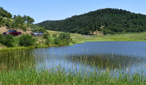 Branson Hiking Club passing alpine lakes, by Tim Keller