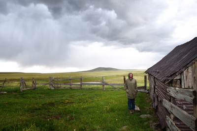 Christina Boyce at Berry barn atop Johnson Mesa in rain