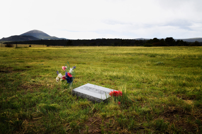 George McJunkin's grave in Folsom Cemetery, Capulin Volcano in background