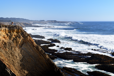 Christina Boyce atop the sea cliffs at Point Arena, California