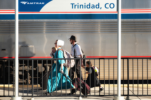 Mennonites rush to board their train at Trinidad, Colorado