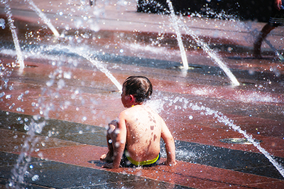 Boy in fountain, Denver's Union Square