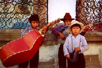 Mayan boys street busking in Oaxaca, 2004, by Tim Keller