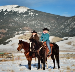 Janna Mills and Ashlee Rose Mills horseback at home in Eagle Nest, January 2016